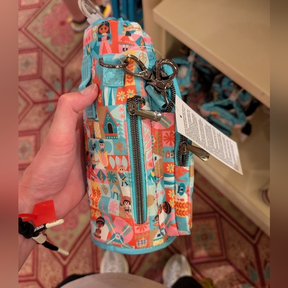 NEW 2024 Disney Parks Lug Huggie Bag Water Bottle Holder It’s A Small World - Picture 4 of 7
